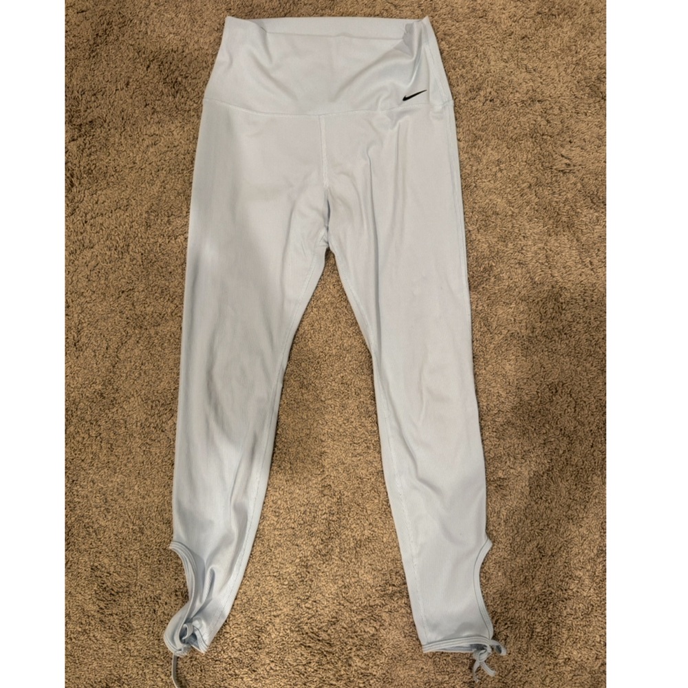 Light Blue DriFit Nike Leggings with Ankle cutout. Size Medium